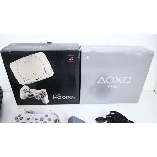 8056 - A boxed Sony Playstation (PS One) model SCPH-102B - complete with original packaging, console, analo... 