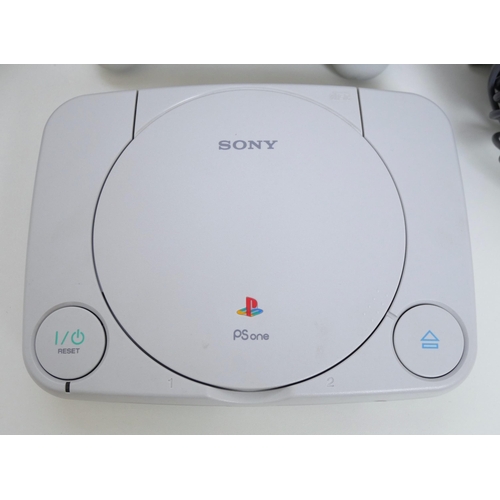 8056 - A boxed Sony Playstation (PS One) model SCPH-102B - complete with original packaging, console, analo... 