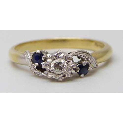 7013 - An 18ct gold, diamond and blue stone ring, 3.5g, O/P