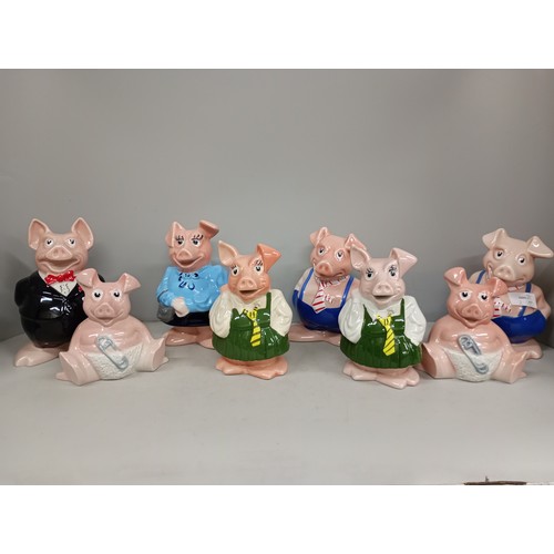 2011 - A collection of eight Wade NatWest pig money banks, one without stopper