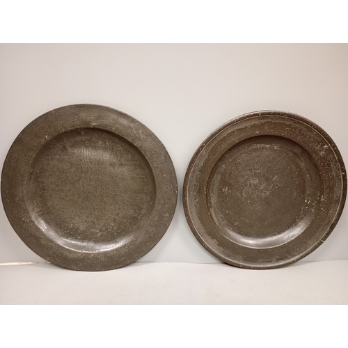 2012 - Two 18th century pewter marriage plates, 23/23.5cm