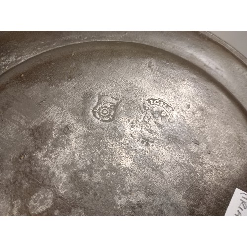 2012 - Two 18th century pewter marriage plates, 23/23.5cm