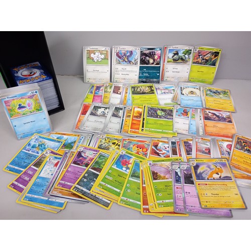 2018 - A large collection of Pokémon cards in collectors tin including holographic