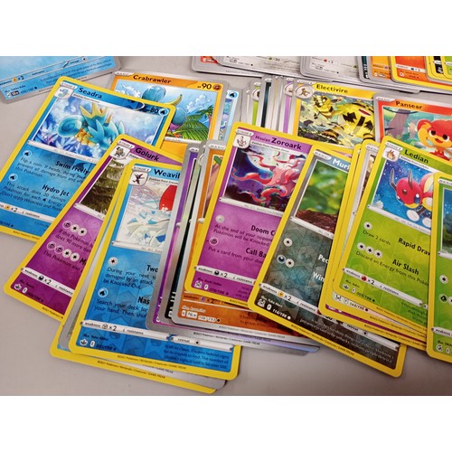 2018 - A large collection of Pokémon cards in collectors tin including holographic