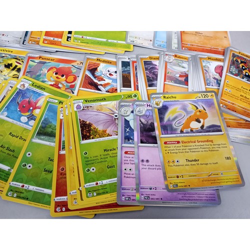 2018 - A large collection of Pokémon cards in collectors tin including holographic