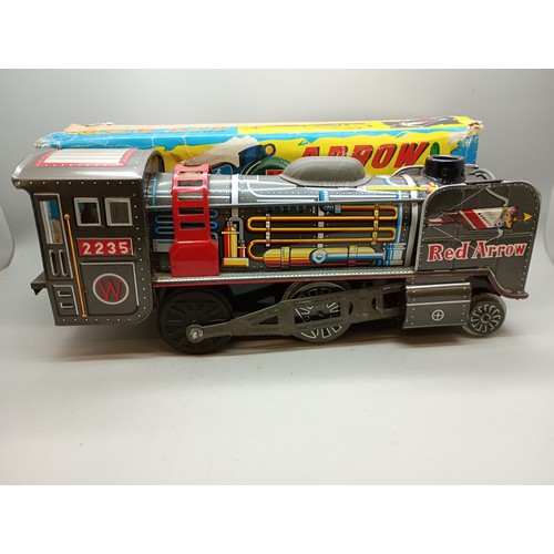 2021 - A tin-plate model Friction Powered 'Red Arrow' locomotive, in original box, made in Japan