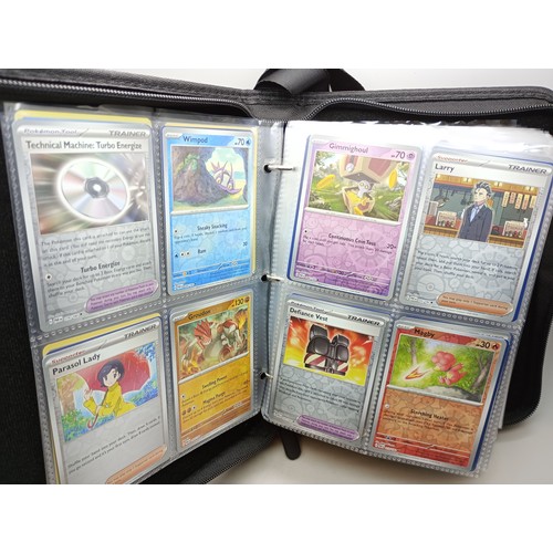 2023 - A Pokémon binder full of holographic cards, approximately 430