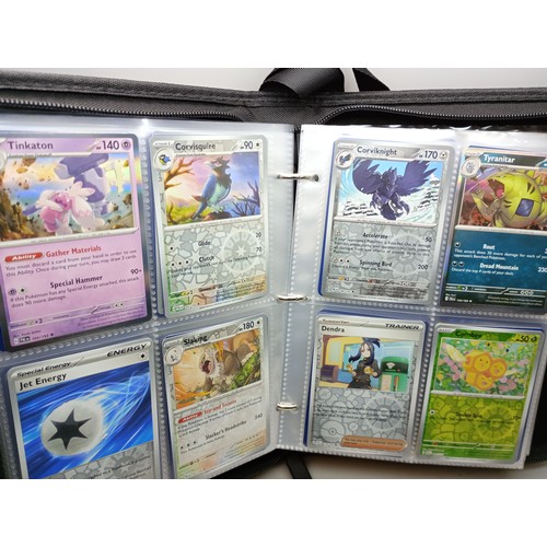 2023 - A Pokémon binder full of holographic cards, approximately 430