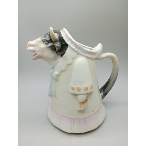 2027 - A Schafer & Vater novelty figural cow cream jug, a/f