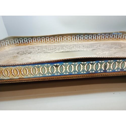 2048 - A mid 20th Century hammered Art Deco style dish or centrepiece and a Sheffield plate on copper tray