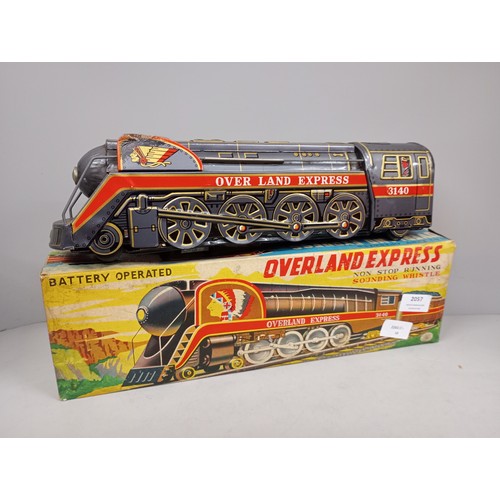 2057 - A tin-plate battery operated toy locomotive Overland Express, non stop running, sounding whistle, by... 