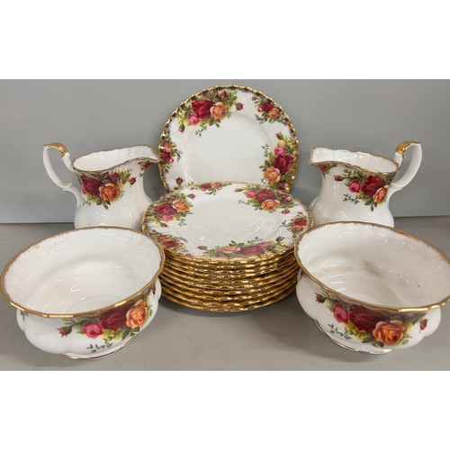 2157 - A Royal Albert Old Country Roses tea set, 10 cups, 13 saucers, 11 side plates, tea pot, 2 cream jugs... 