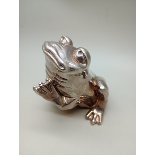 7271 - A silver covered model of a frog, stamped 925, weighted, 150g total, 7.5cm tall