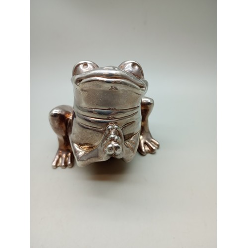 7271 - A silver covered model of a frog, stamped 925, weighted, 150g total, 7.5cm tall