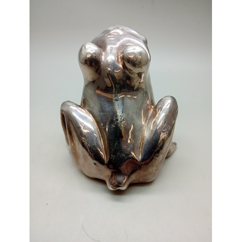 7271 - A silver covered model of a frog, stamped 925, weighted, 150g total, 7.5cm tall