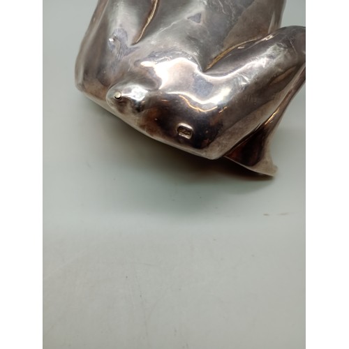 7271 - A silver covered model of a frog, stamped 925, weighted, 150g total, 7.5cm tall