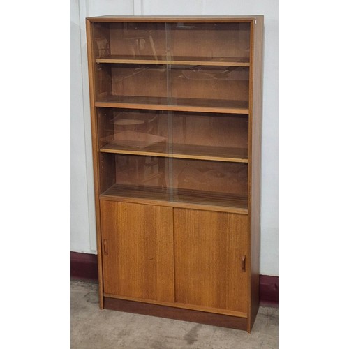 16 - A Herbert Gibbs teak bookcase