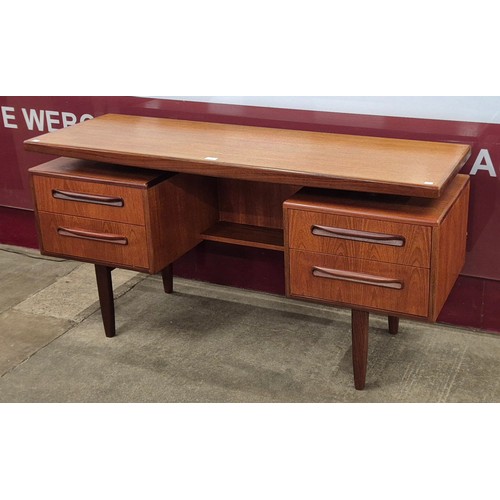 23 - A G-Plan Fresco teak floating top desk