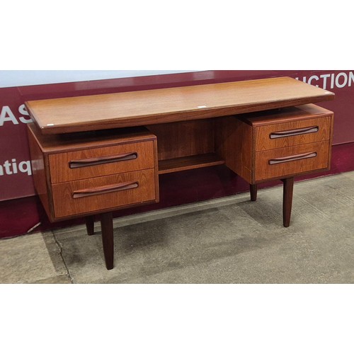 23 - A G-Plan Fresco teak floating top desk