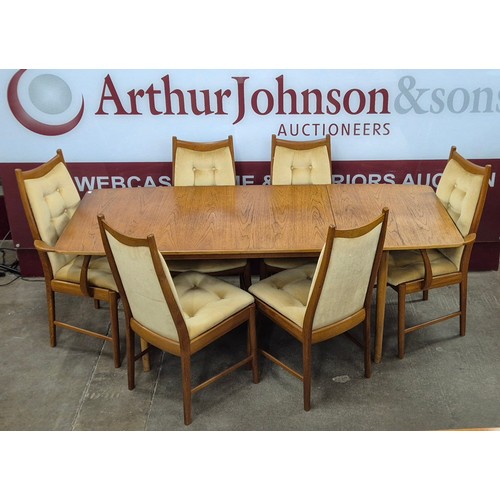 30 - A teak rectangular drop leaf dining table and six Mcintosh dining chairs