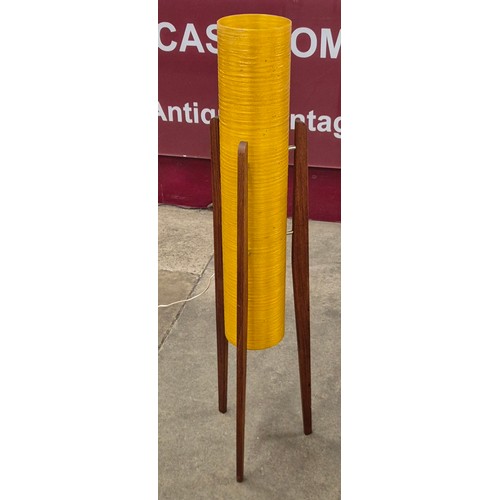 33 - A teak and yellow fibreglass rocket lamp