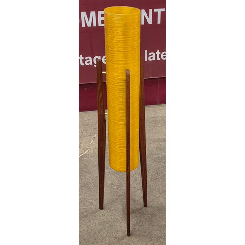 33 - A teak and yellow fibreglass rocket lamp