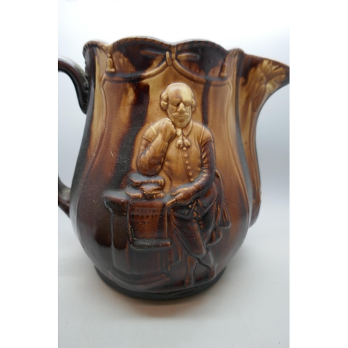 2009 - A large Rockingham pitcher with Shakespeare detail, height 24cm