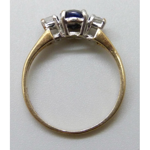 7002 - A 9ct gold, sapphire and white stone ring, 1.7g, K