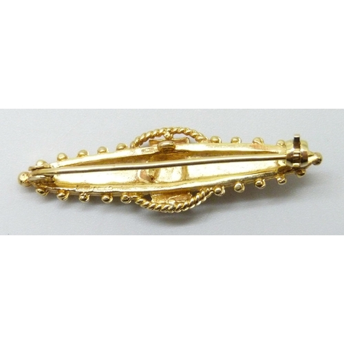 7004 - A 9ct gold bar brooch, 5.6g, 4.3cm, and a 9ct gold locket, 4g, 2.1cm, bale with solder mark