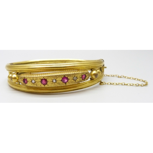 7005 - Two Victorian gilt bangles, one set with diamonds, 19g total weight