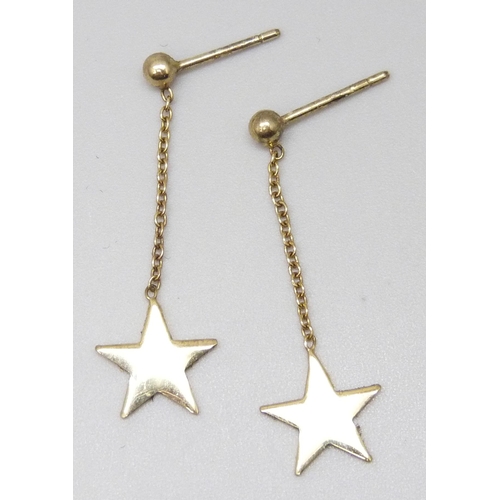 7023 - A pair of silver gilt star drop earrings, 3cm drop