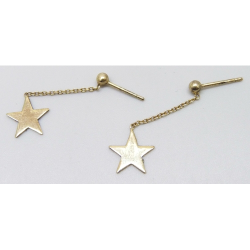 7023 - A pair of silver gilt star drop earrings, 3cm drop