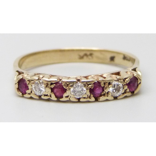 7024 - A yellow metal, ruby and diamond ring, 2.5g, S