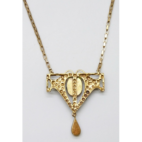 7034 - An Art Nouveau style gilt metal enamelled necklace, pendant 4cm