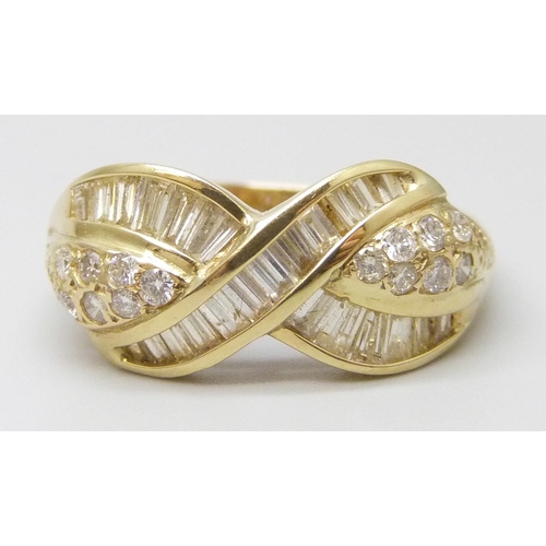 7042 - An 18ct gold diamond set crossover ring, 5.9g, T/U