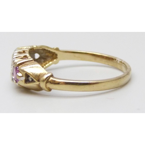 7043 - A 9ct gold ring set with rubies and diamonds, 1.9g, O