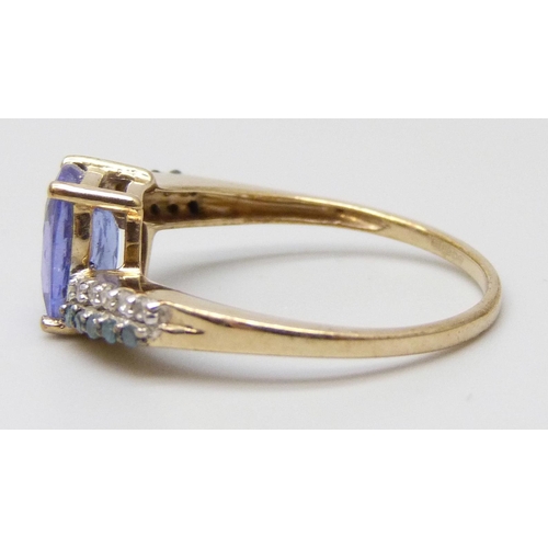 7045 - A 9ct gold, tanzanite and diamond ring, 2g, O