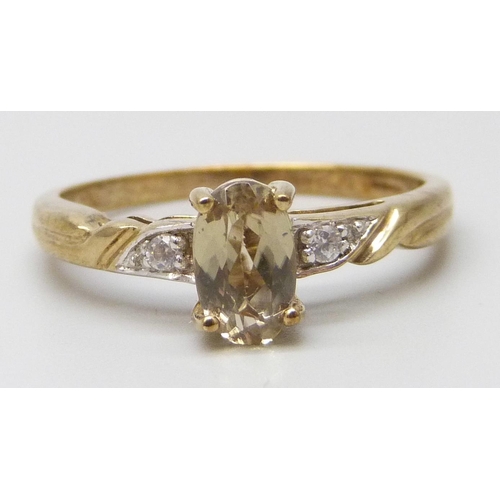 7047 - A 9ct gold andalucite and zircon ring, 2.9g, U