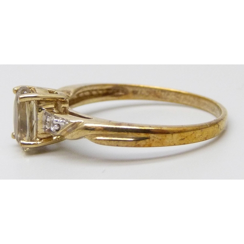 7047 - A 9ct gold andalucite and zircon ring, 2.9g, U