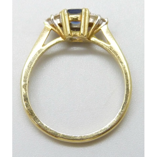 7057 - An 18ct gold, diamond and sapphire ring, 3g, N