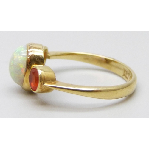 7058 - An 18ct gold opal set ring, 3.4g, N