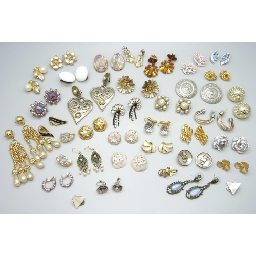 A collection of vintage clip on earrings