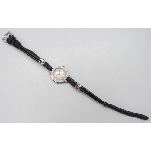 7189 - A lady's platinum and diamond cocktail wristwatch, 19mm including crown