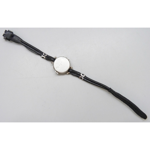 7189 - A lady's platinum and diamond cocktail wristwatch, 19mm including crown