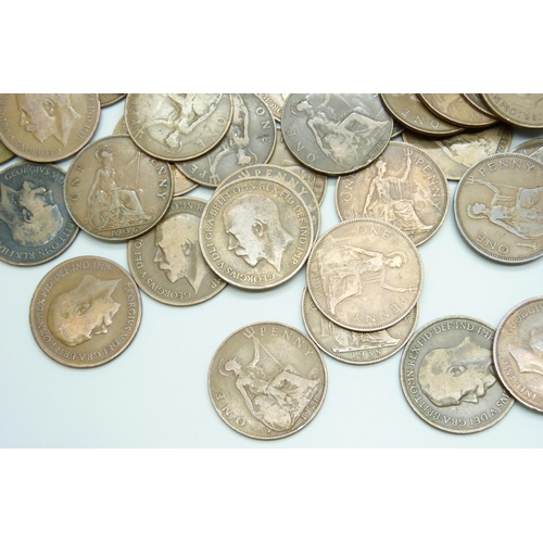 7210 - A collection of approximately 100 George VI pennies together with approximately 50 George V pennies