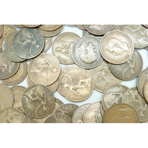 7210 - A collection of approximately 100 George VI pennies together with approximately 50 George V pennies