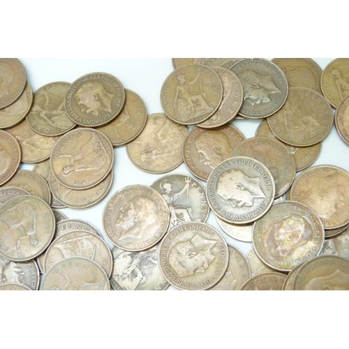 7210 - A collection of approximately 100 George VI pennies together with approximately 50 George V pennies