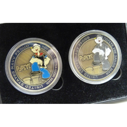 A two coin set, Popeye The Sailorman, in case with unassociated certificate