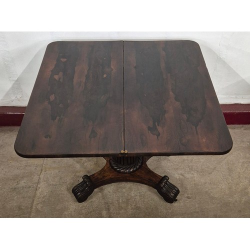 162 - A Regency rosewood D-shaped fold over tea table