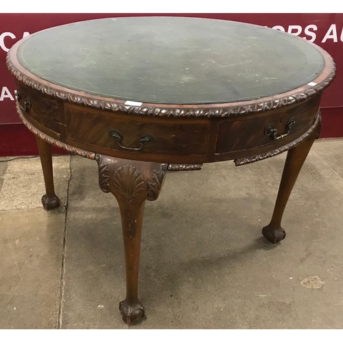 191 - A George I style mahogany and green leather topped circular library table